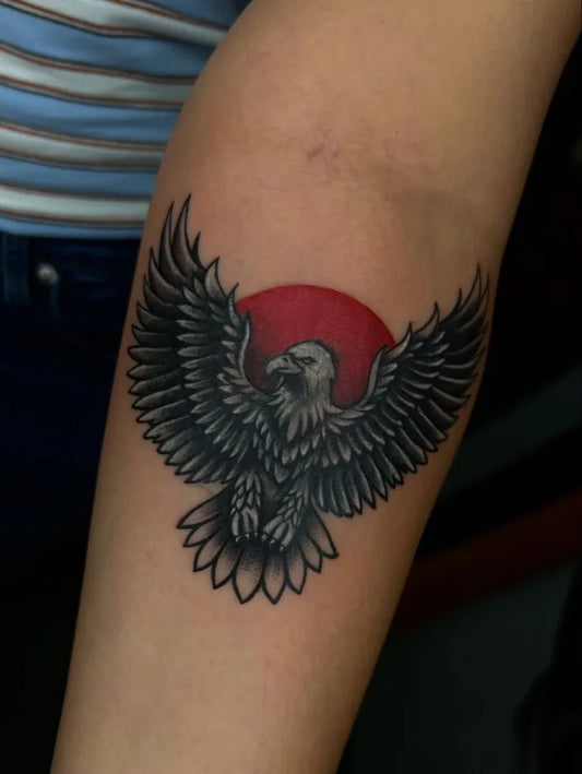 Medium Blackwork Eagle with Sun Tattoo on Women Arm by @aruna_tattooist