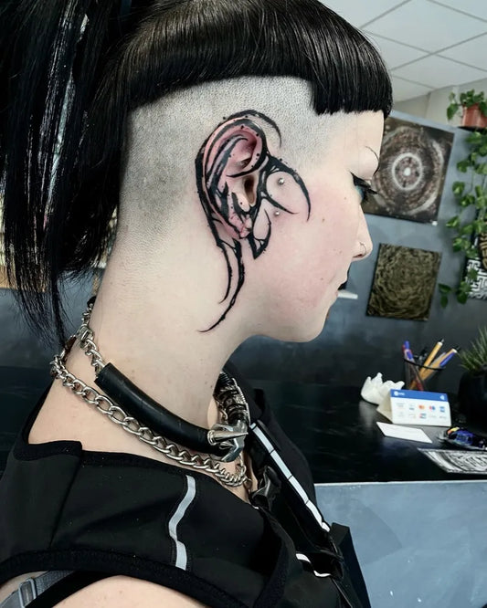 Medium Blackwork Ear Tattoo on Women Behind the Ear by @oraxk1