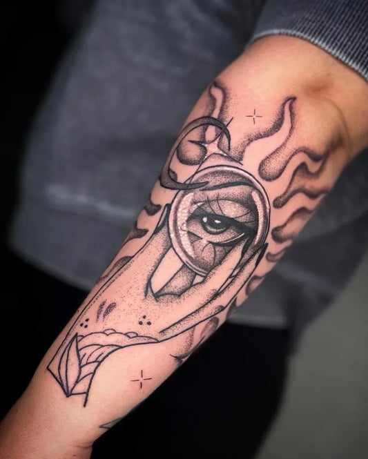 Medium Blackwork Eye with Flames Spiritual Tattoo on Men Arm by @sixteen42studios