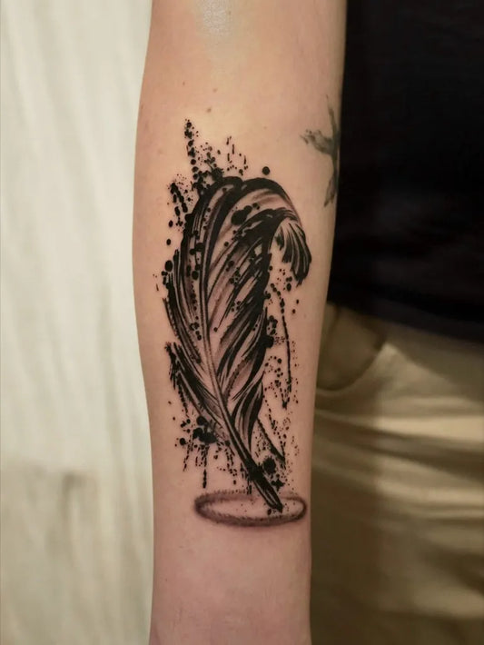 Medium Blackwork Feather and Circle Tattoo on Women Arm by @xiael_tattooer