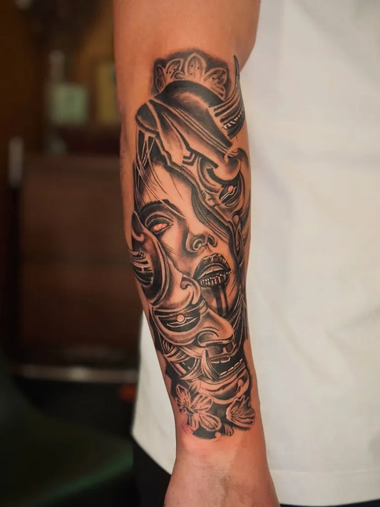 Medium Blackwork Female Face with Flowers on Men Arm Tattoo by @saintxtattoos