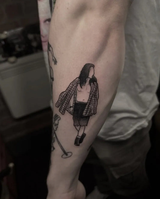 Medium Blackwork Figure with Guitar Music Tattoo on Men Arm by @antclaytattoo