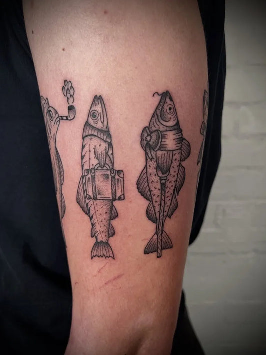 Medium Blackwork Fish Tattoo on Men Arm by @jack_henry_tattoo