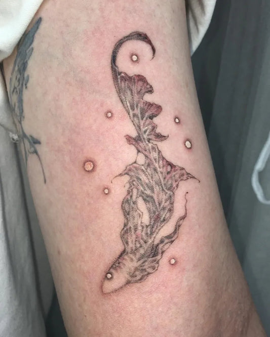 Medium Blackwork Fish Tattoo on Men Arm by @segye.tt