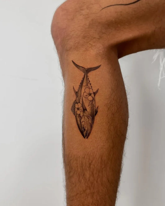 Medium Blackwork Fish and Flowers Tattoo on Men Leg by @mogiz.tattoo