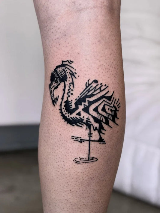 Medium Blackwork Flamingo Tattoo on Men Leg by @denizcimlikaya