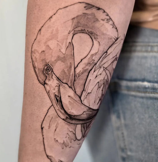 Medium Blackwork Flamingo Tattoo on Women Arm by @mauds.canvas