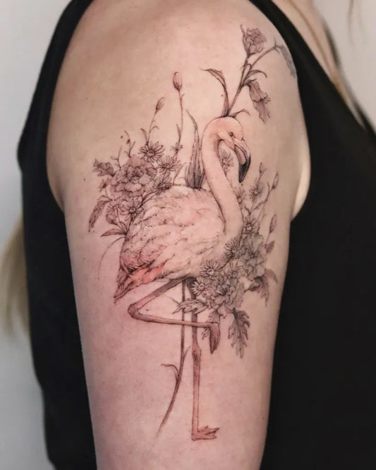 Medium Blackwork Flamingo and Flowers Tattoo on Women Shoulder by @ondo.tattoo