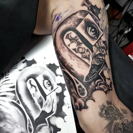 Medium Blackwork Flamingo with Eye Tattoo on Women Arm by @akeryart