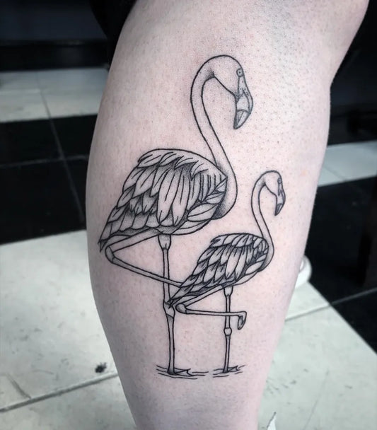 Medium Blackwork Flamingos Tattoo on Women Leg by @amyjtattoos