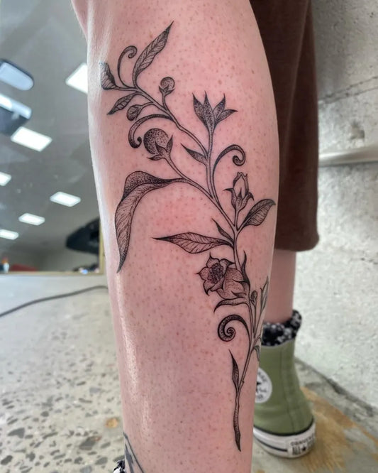 Medium Blackwork Floral Vine Tattoo on Women Calf by @rappart_