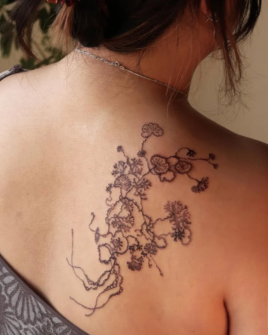 Medium Blackwork Floral Vines Tattoo on Women Shoulder by @jangmi.ink