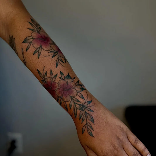 Medium Blackwork Flowers Tattoo on Women Arm by @intentionalartforthebrave