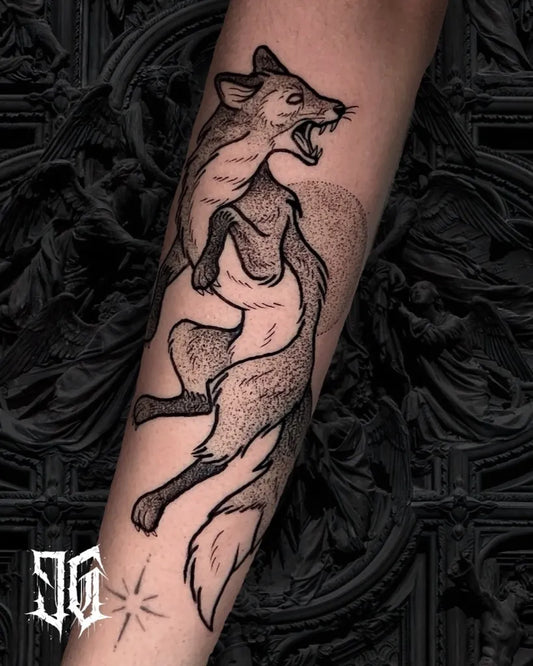 Medium Blackwork Fox Tattoo on Men Arm by @juan.s.gaviria