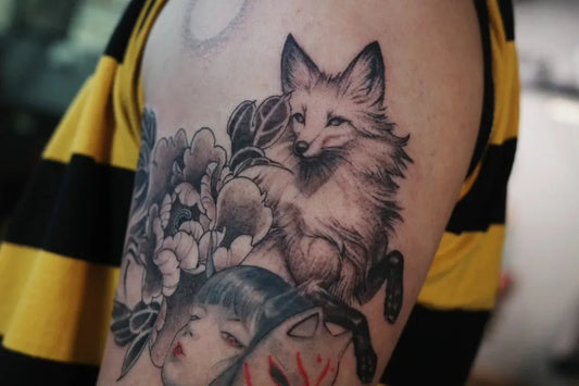 Medium Blackwork Fox and Fox Mask Tattoo on Women Arm by @rui_tattooartist