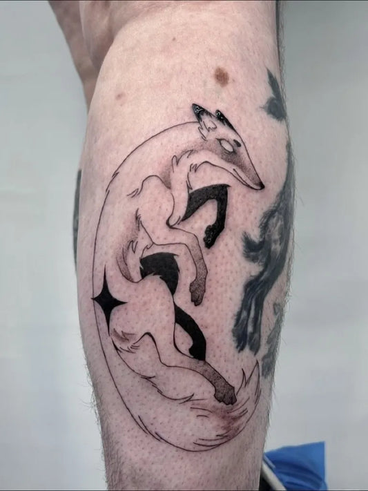 Medium Blackwork Fox and Moon Tattoo on Men Leg by @mastilnicatattoo