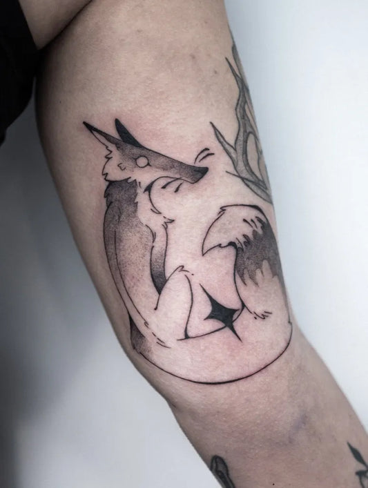 Medium Blackwork Fox and Wings Tattoo on Women Arm by @wurriko