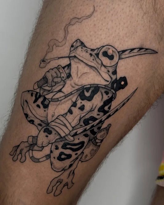 Medium Blackwork Frog Warrior Tattoo on Men Leg by @cejaymedio_tattoo