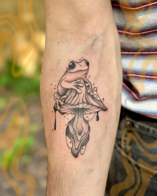 Medium Blackwork Frog and Mushroom on Men Arm Tattoo by @the.psychedelic.unicorn
