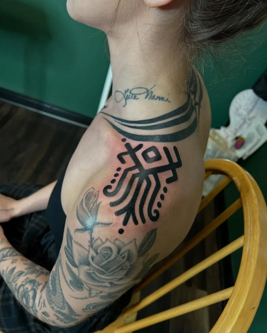 Medium Blackwork Geometric Tribal Tattoo on Women Shoulder by @monkthemaji
