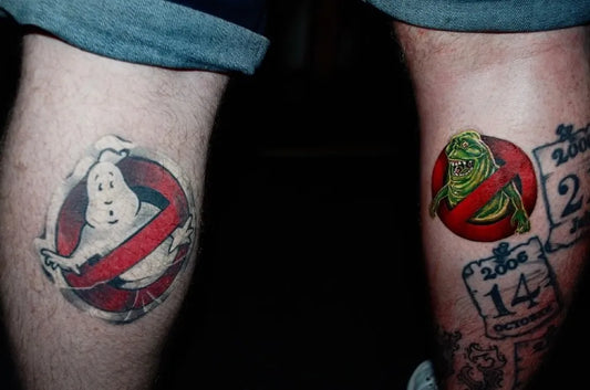 Medium Blackwork Ghostbusters Logo and Slimer Tattoo on Men Calf by @beatrizvillacortas