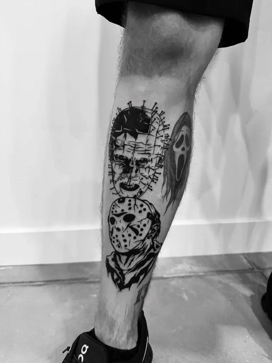 Medium Blackwork Hellraiser and Jason Voorhees Horror Tattoo on Men Leg by @violentwire