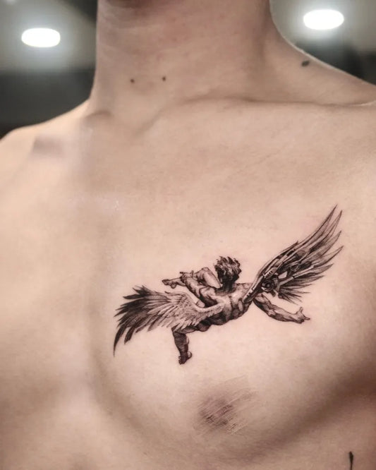Medium Blackwork Icarus with Wings on Men Chest Tattoo by @40.tatt