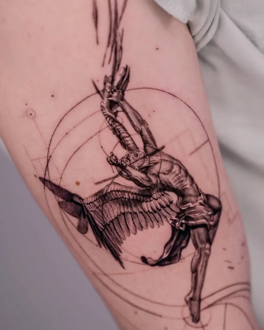 Medium Blackwork Icarus with Wings on Women Arm Tattoo by @mr.t_tattoos