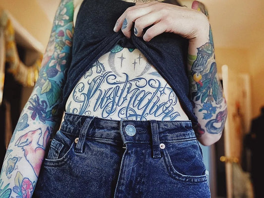 Medium Blackwork Inspiration Script Tattoo on Women Stomach by @piixiequeen
