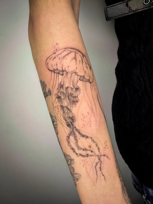 Medium Blackwork Jellyfish Tattoo on Women Arm by @redleiftattoo