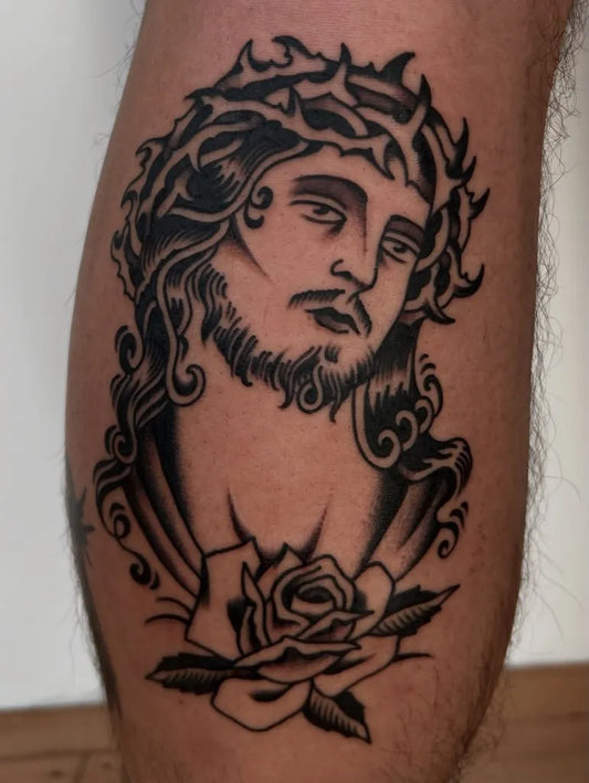 Medium Blackwork Jesus with Rose Tattoo on Men Thigh by @j.l.rabinoff