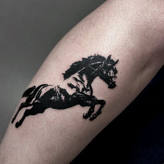 Medium Blackwork Jumping Horse Tattoo on Men Leg by @tatttuirovka