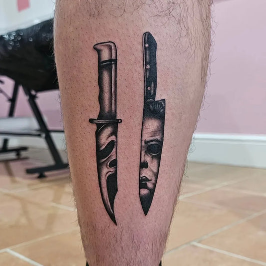 Medium Blackwork Knife Masks Horror Tattoo on Men Leg by @jessi.t.tattoos