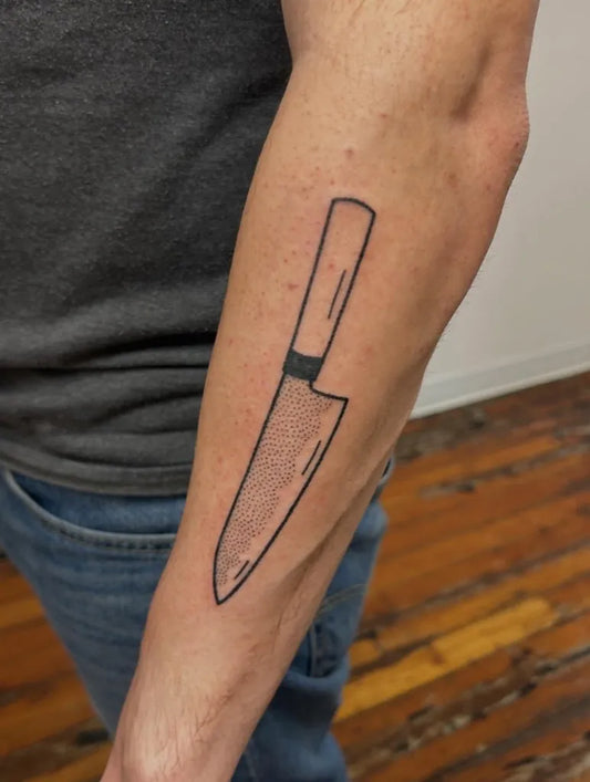 Medium Blackwork Knife Tattoo on Men Arm by @owen_the_massachusite