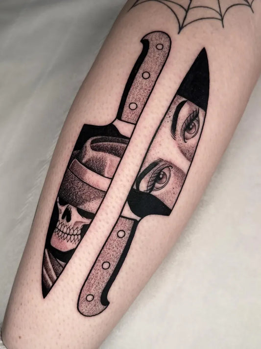 Medium Blackwork Knife and Skull Tattoo on Women Thigh by @caseymarietattoo