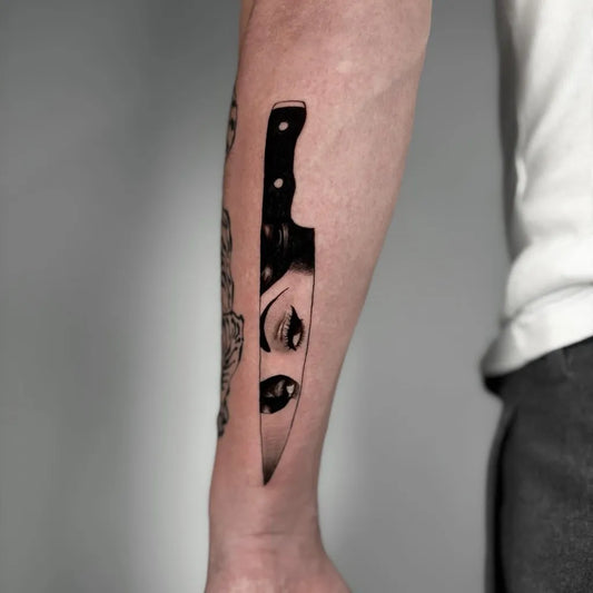 Medium Blackwork Knife with Eye Tattoo on Men Arm by @levacktattoo