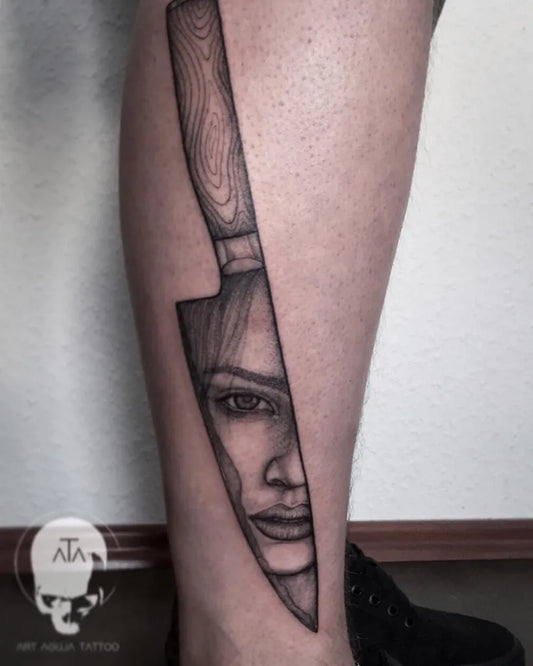 Medium Blackwork Knife with Face Tattoo on Men Leg by @gil.kolja