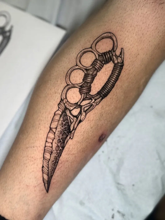 Medium Blackwork Knuckleduster Knife Tattoo on Men Forearm by @lindsayrosetattoos