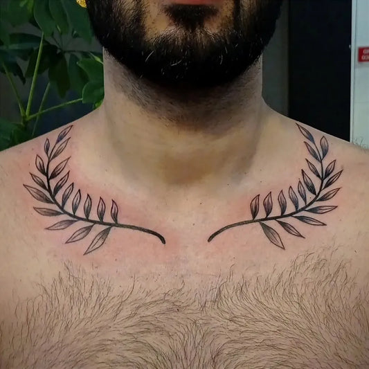 Medium Blackwork Laurel Wreath Tattoo on Men Neck by @clarktattoo_