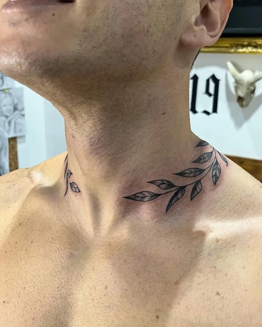 Medium Blackwork Laurel Wreath Tattoo on Men Neck by @ink_stain_by_kurt_cassar