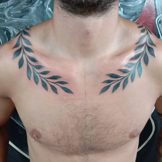 Medium Blackwork Laurel Wreath Tattoo on Men Neck by @sidelineinkbali