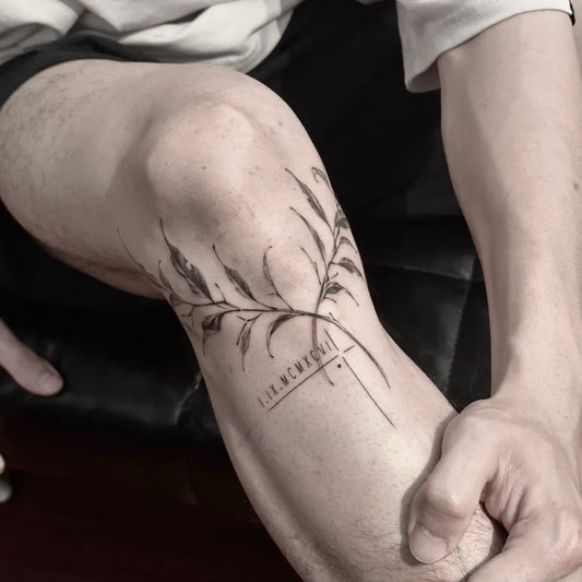 Medium Blackwork Laurel Wreath with Branches and Text Tattoo on Men Knee by @bonus0203