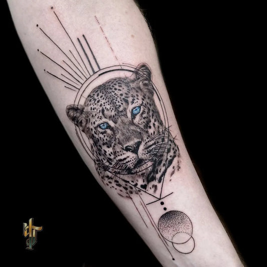 Medium Blackwork Leopard Geometric Tattoo on Men Arm by @giltmothtattoo