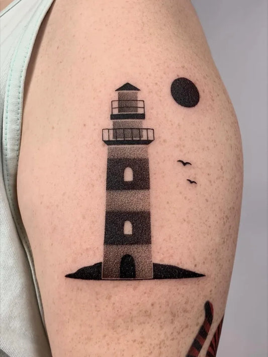 Medium Blackwork Lighthouse Moon Birds Tattoo on Men Shoulder by @velco.tattoo