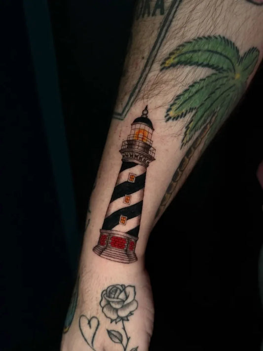 Medium Blackwork Lighthouse Tattoo on Men Arm by @embertatz