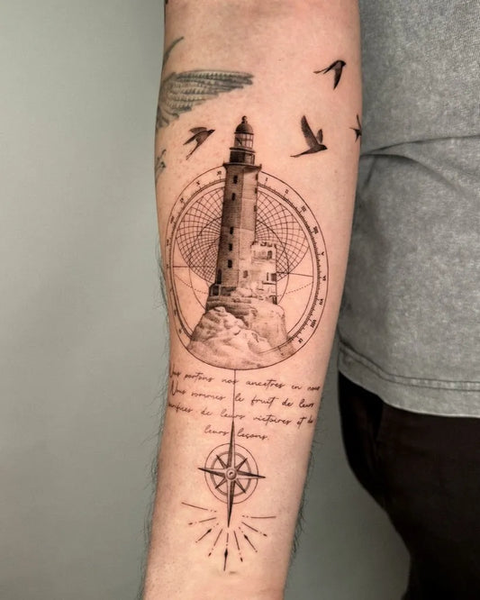Medium Blackwork Lighthouse and Compass Tattoo on Men Arm by @selma.tattoo