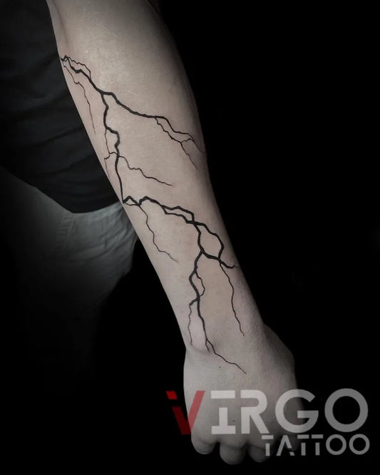 Medium Blackwork Lightning Bolts Tattoo on Men Arm by @virgo_tattoo