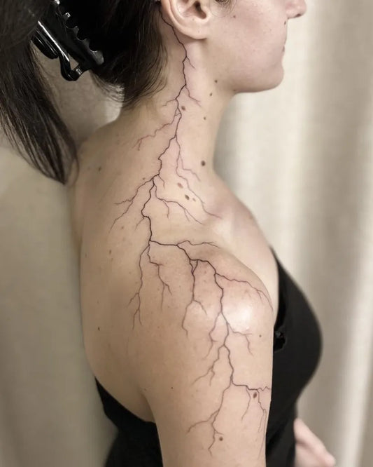 Medium Blackwork Lightning Bolts Tattoo on Women Neck by @thriveinkstudio