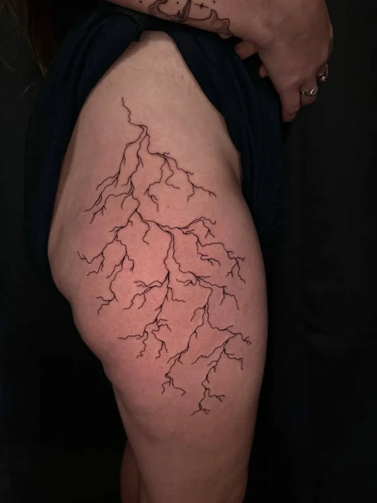 Medium Blackwork Lightning Branches Tattoo on Women Thigh by @embertatz
