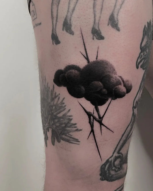 Medium Blackwork Lightning Cloud Tattoo on Men Thigh by @marco.odio